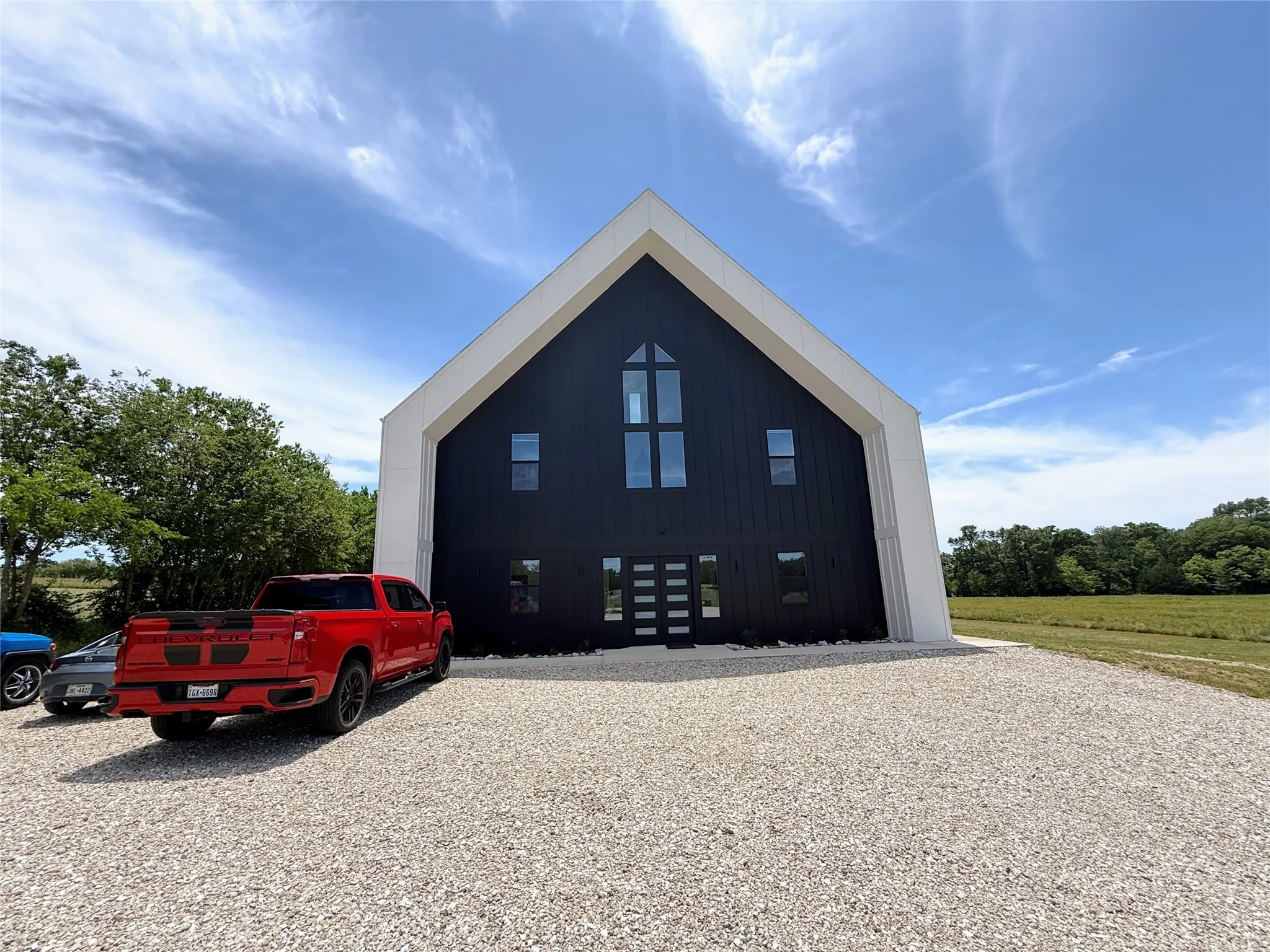 View of side of property featuring board and batten siding