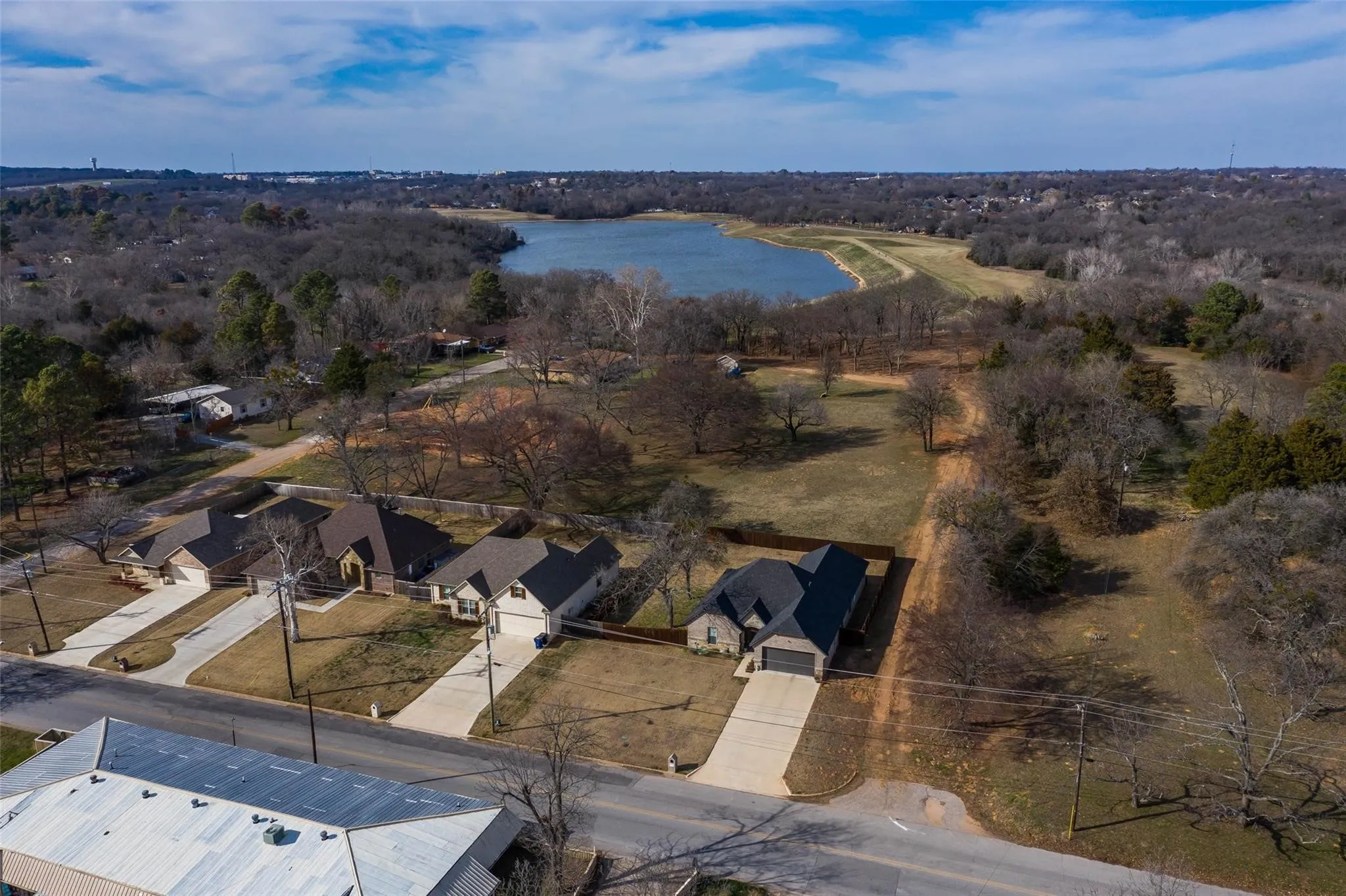 Newer builds line the street where you have a private drive to take you back to your quiet retreat.