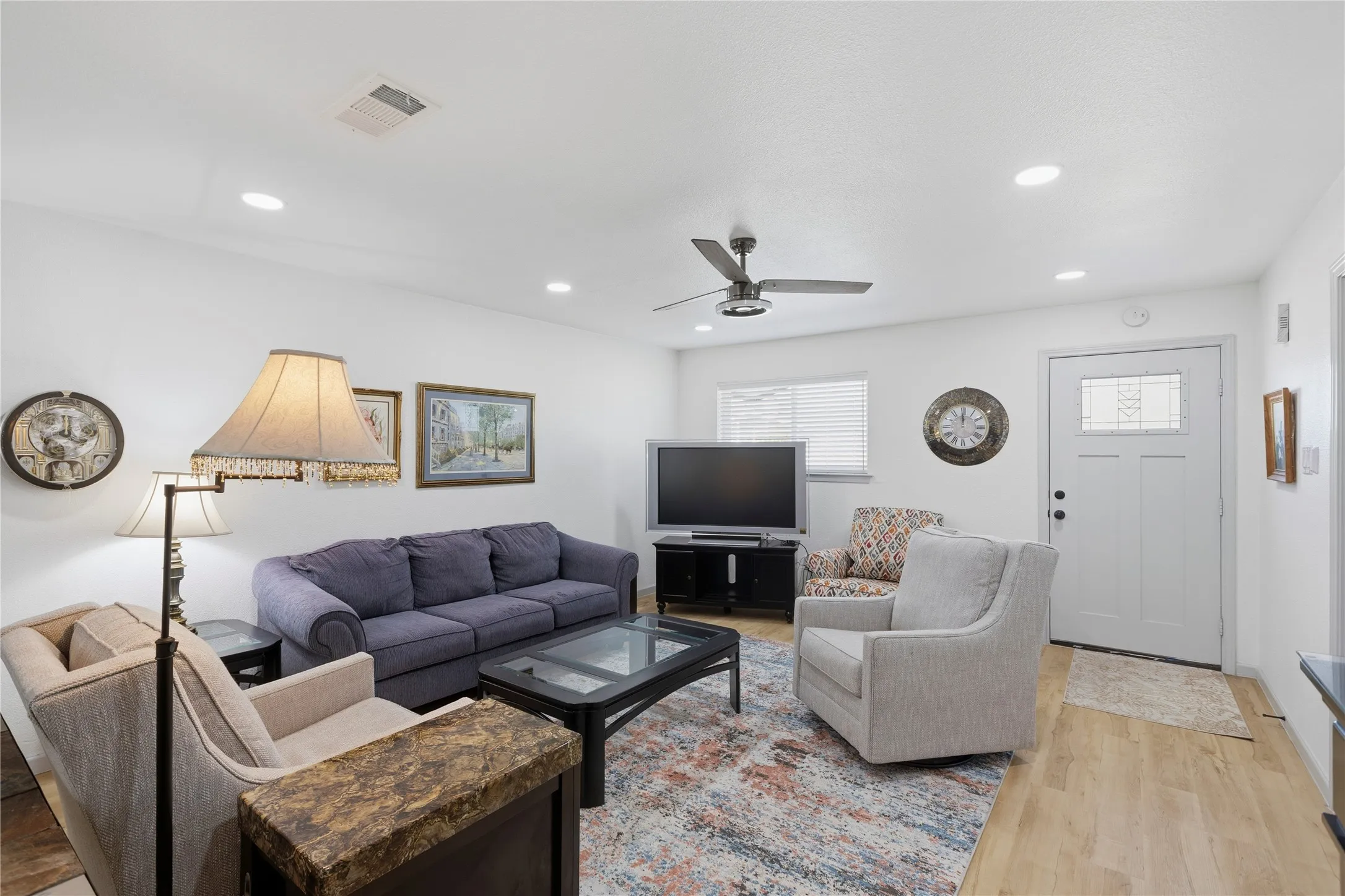 RELAX IN THIS WARM AND ENVITING LIVING ROOM!
