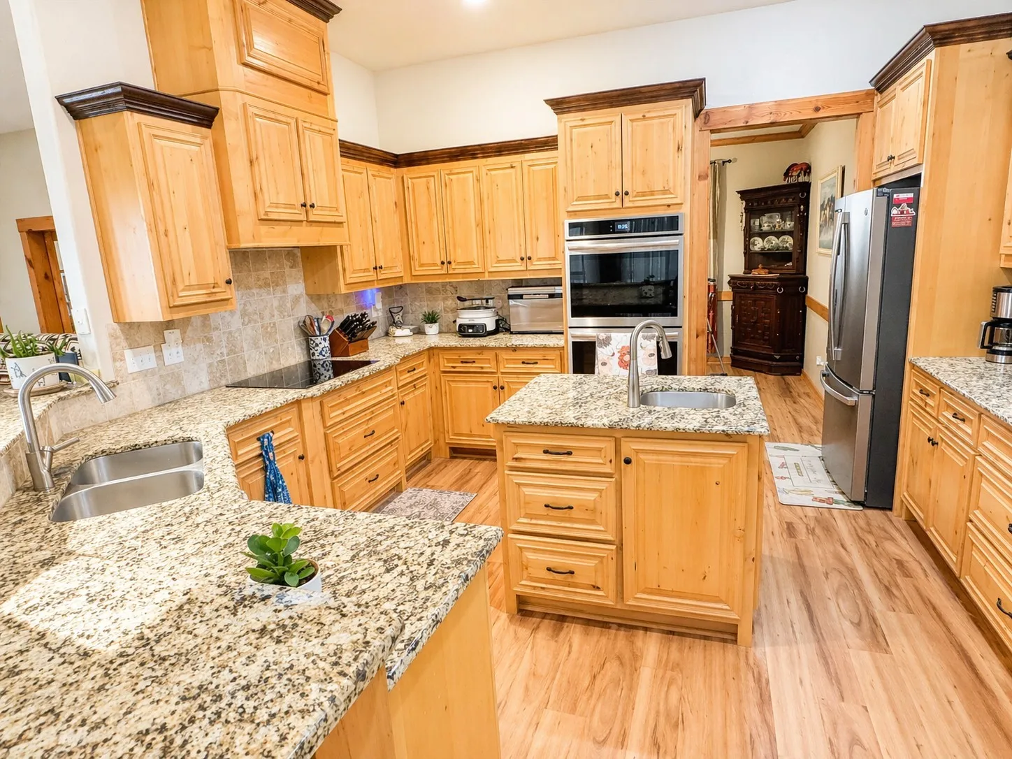 Open kitchen concept with prep island and sink