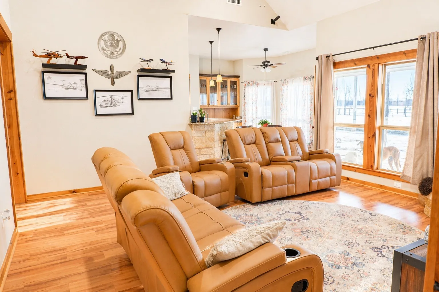 spacious living room with wood look flooring