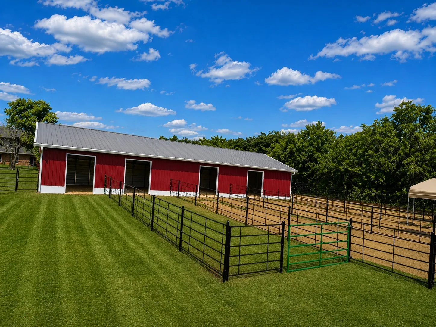 8 stall horse barn with 3 separated paddocks with each leading out to cross fenced pasture