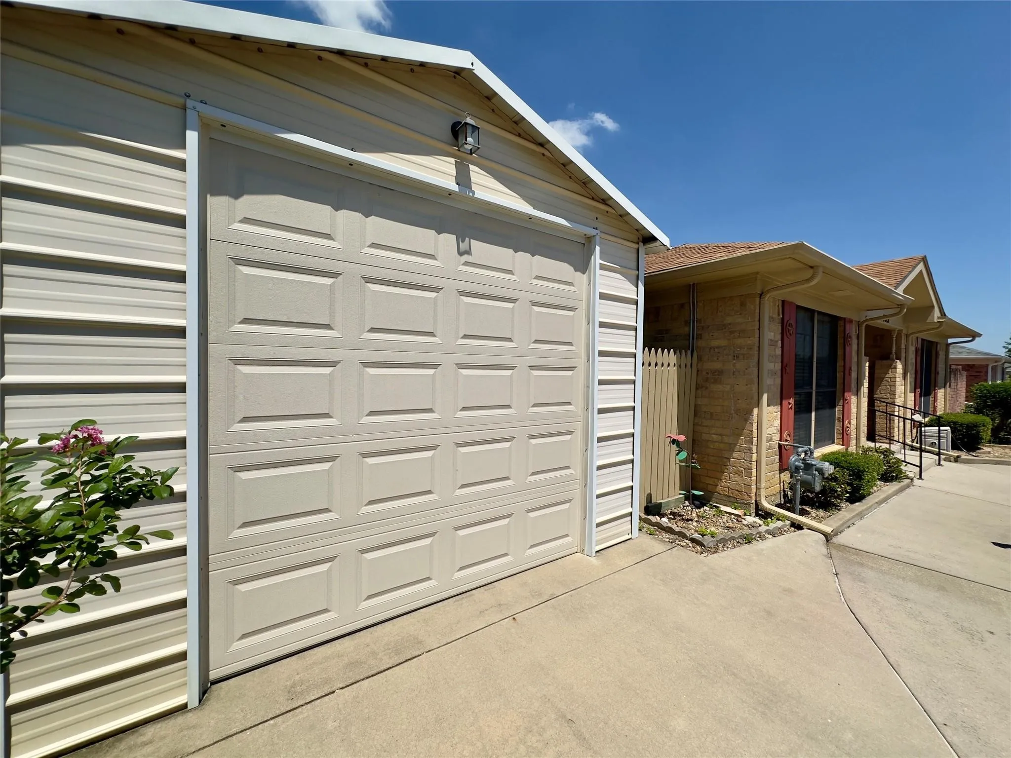 Enclosed carport creating covered 3rd car parking