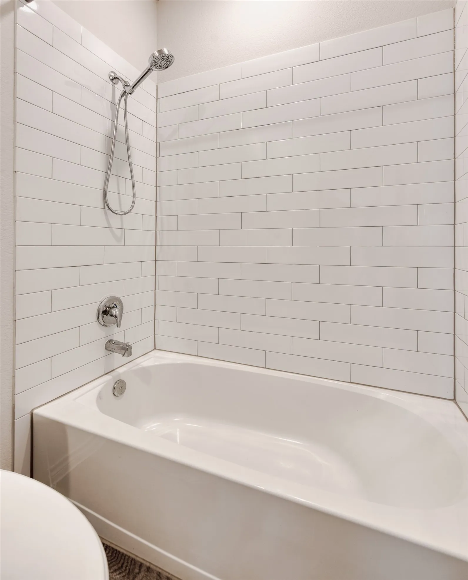 Bathroom with  shower combination and toilet