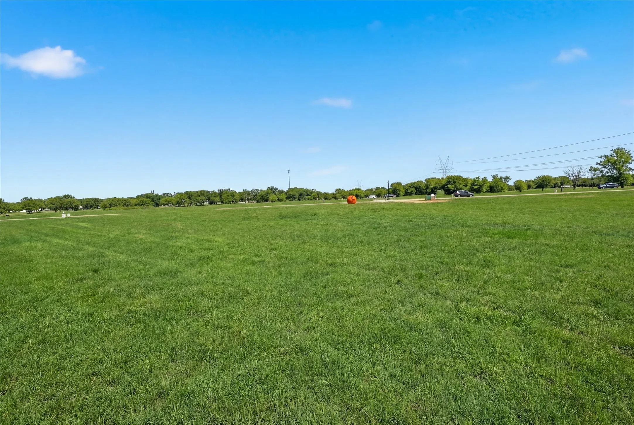This is a photograph of Lot 3 Block H and was captured in February. It has been digitally enhanced to emphasize the presence of leaves and grass.