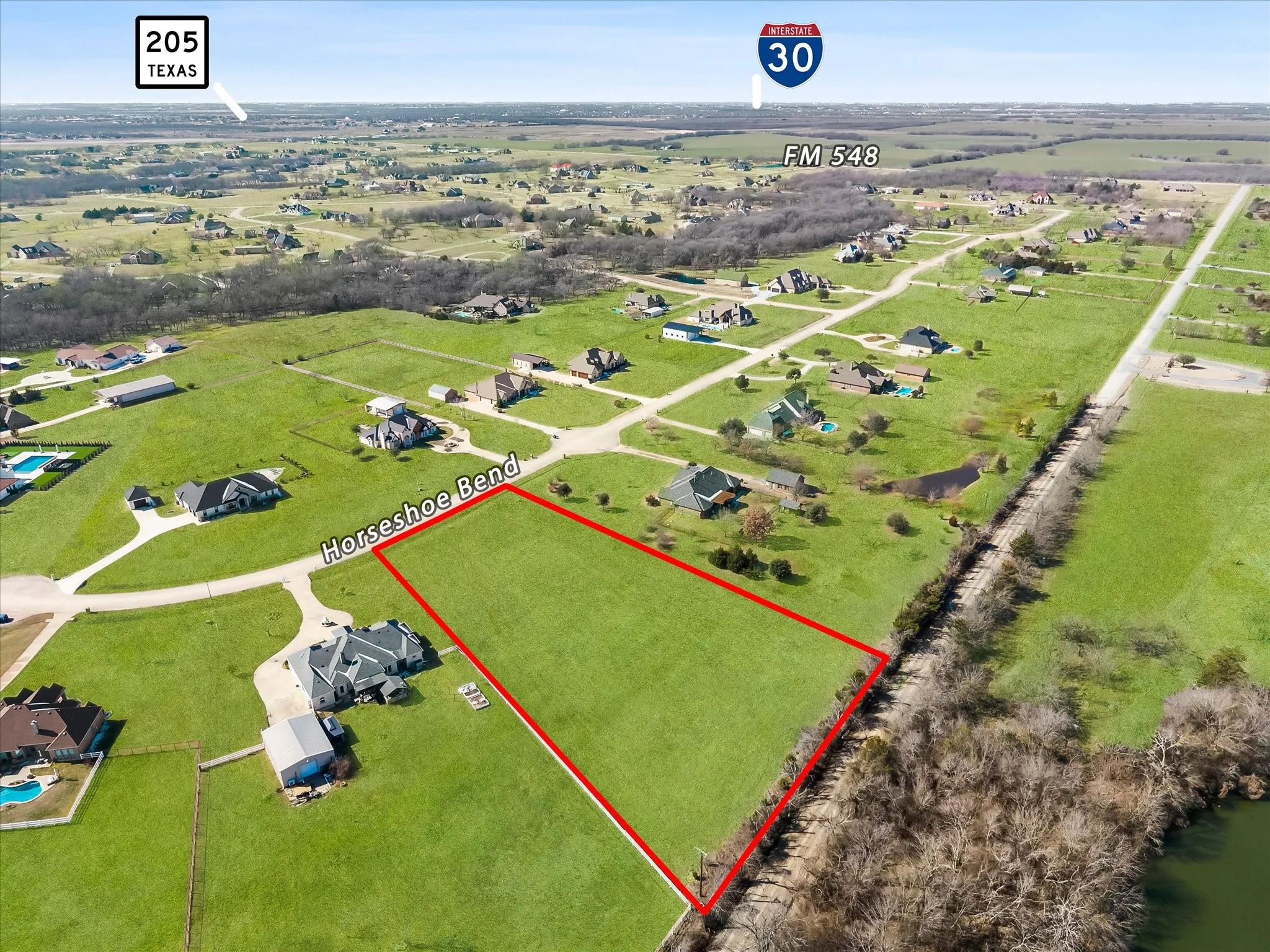 Aerial view of property's location with property parcel outlined