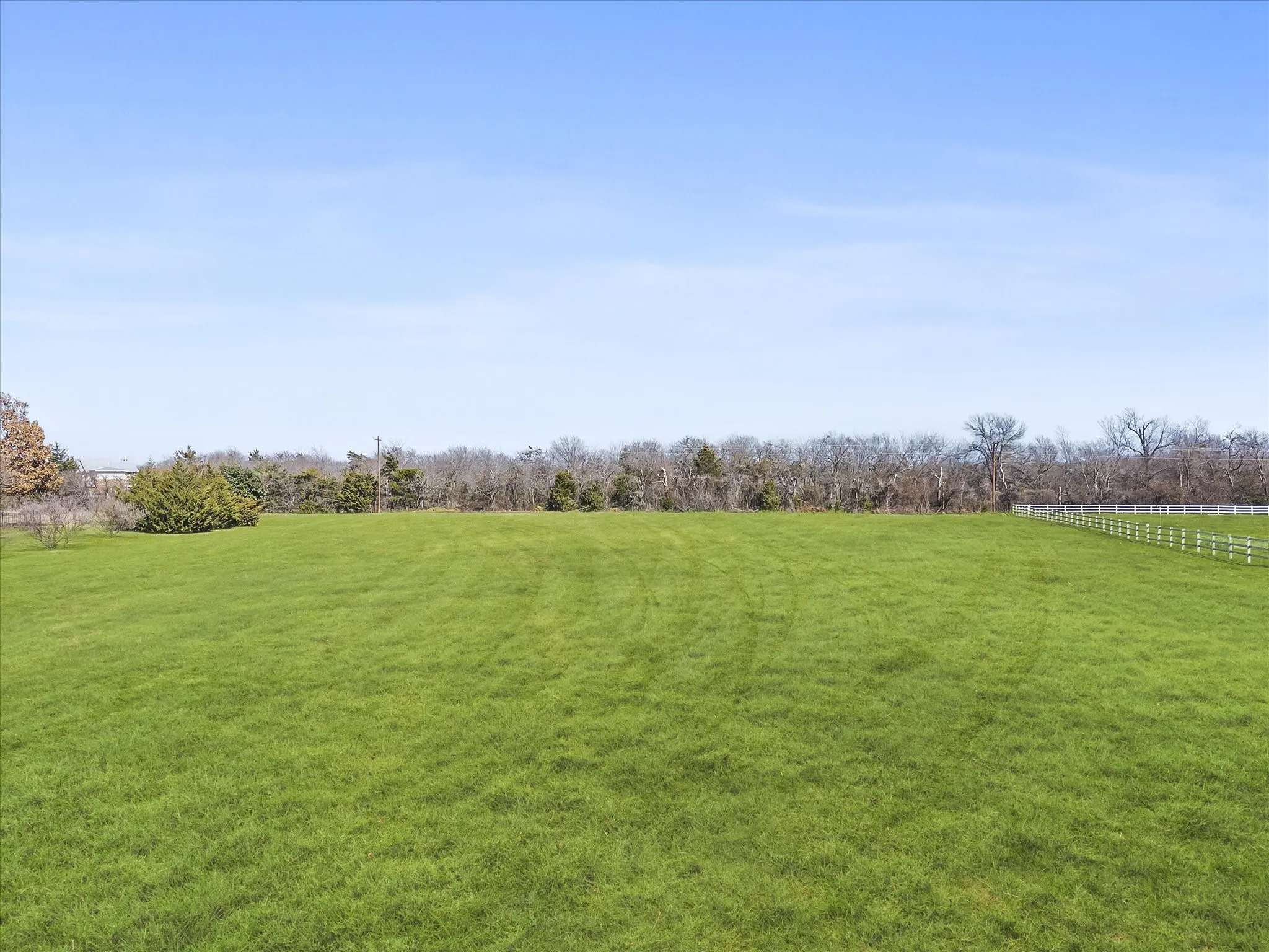 View of yard with a rural view