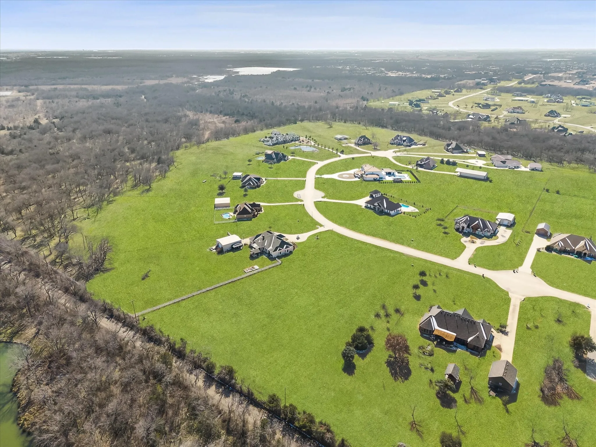 View of property location featuring a forest