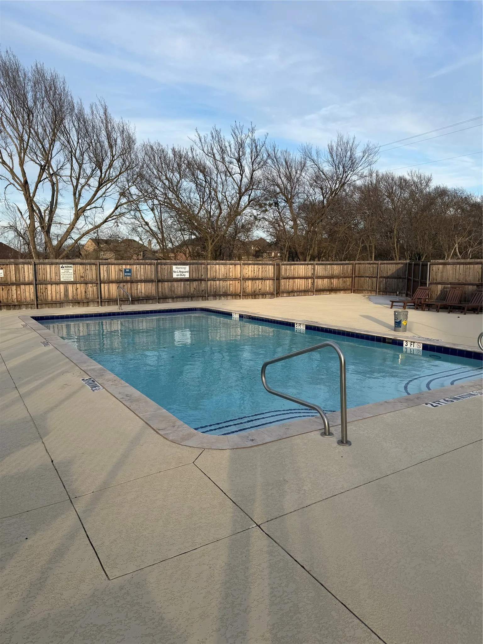 Community pool featuring a patio area