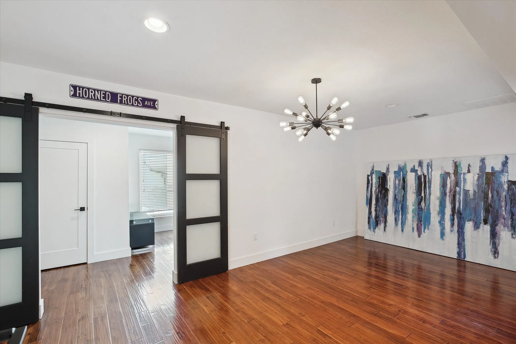 Living area that flows from the bedroom on the main floor.