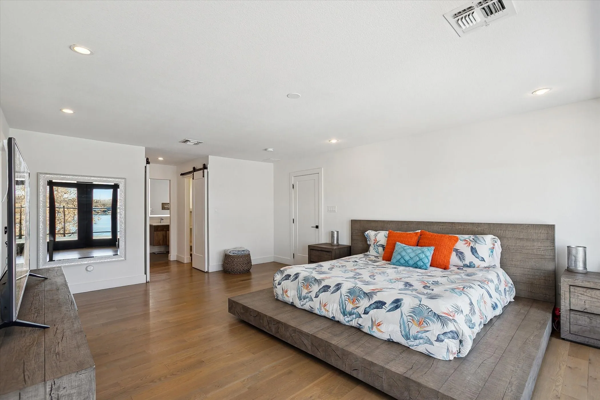 Primary bedroom with double closets and ensuite bathroom.