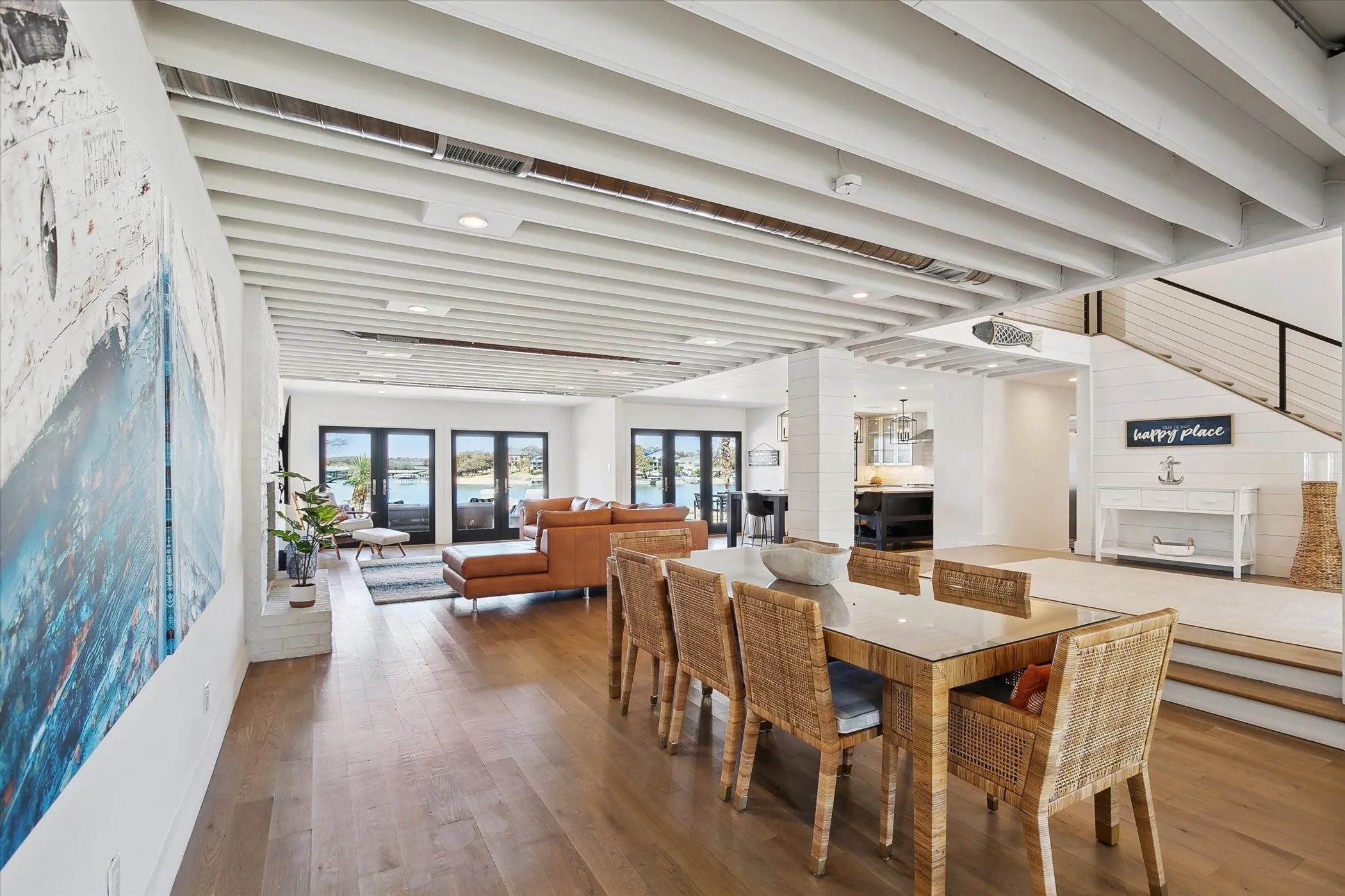 Formal dining room open to entryway, living room and kitchen with view of water!