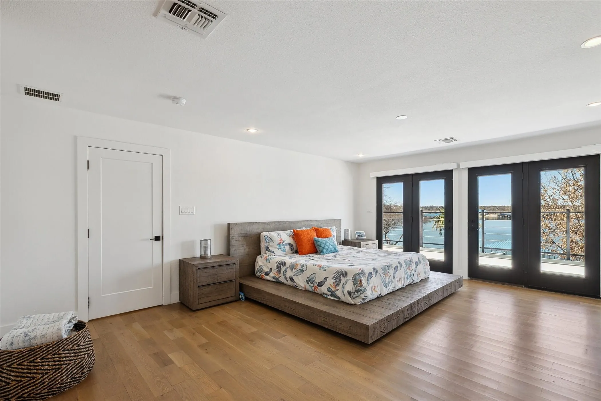 Primary bedroom with access to balcony and gorgeous views!