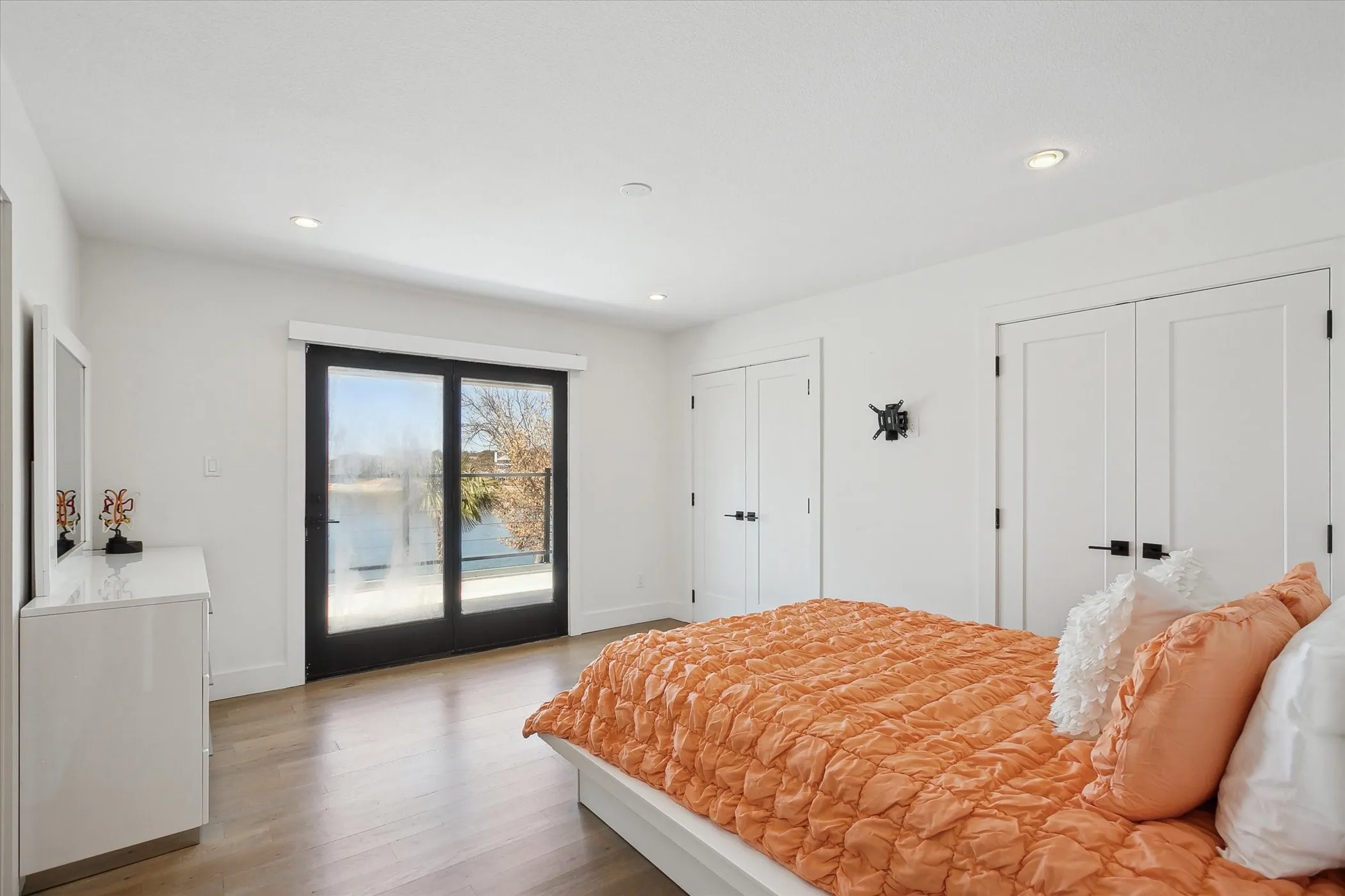 Secondary bedroom with gorgeous views and access to balcony, view of water and access to jack and jill bathroom.