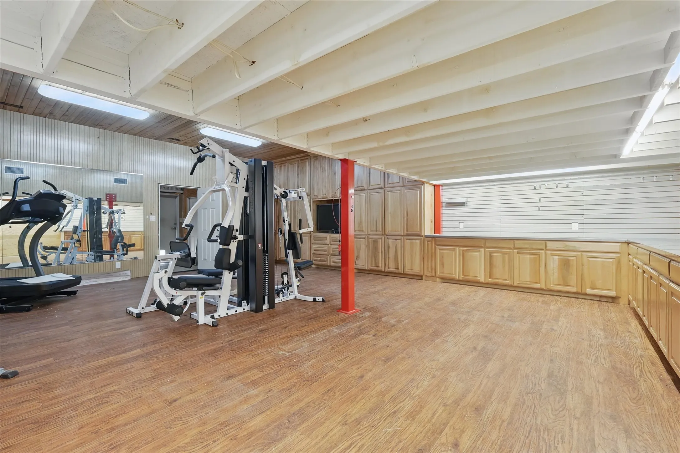 Air conditioned area of the 50x40 shop with cabinets and workspace