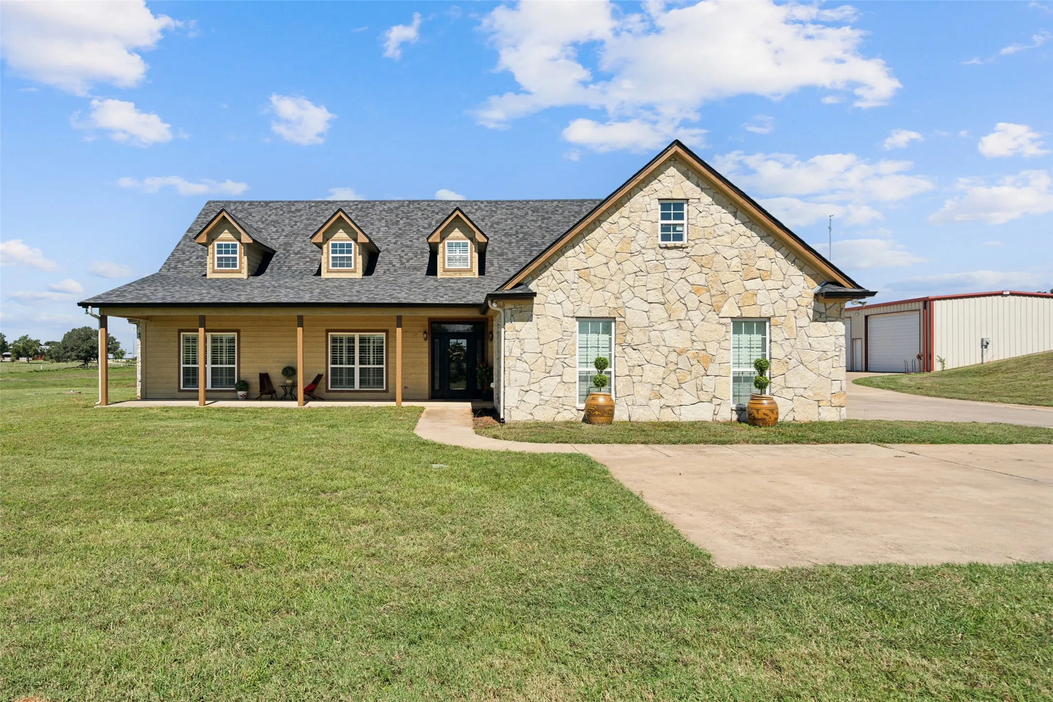 View of the front of the Prairie-style home