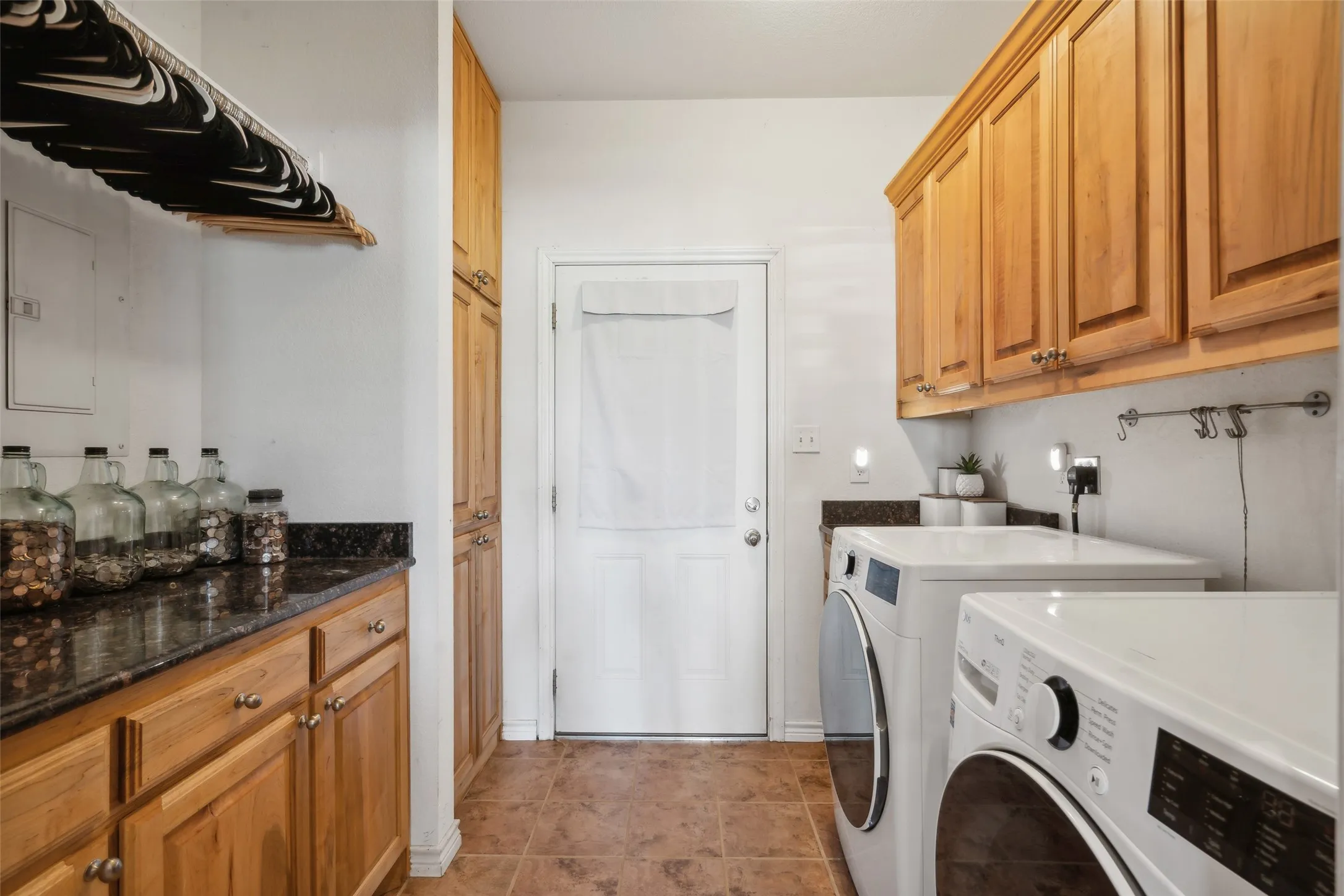 The laundry in the main house has lots of storage and countertop space