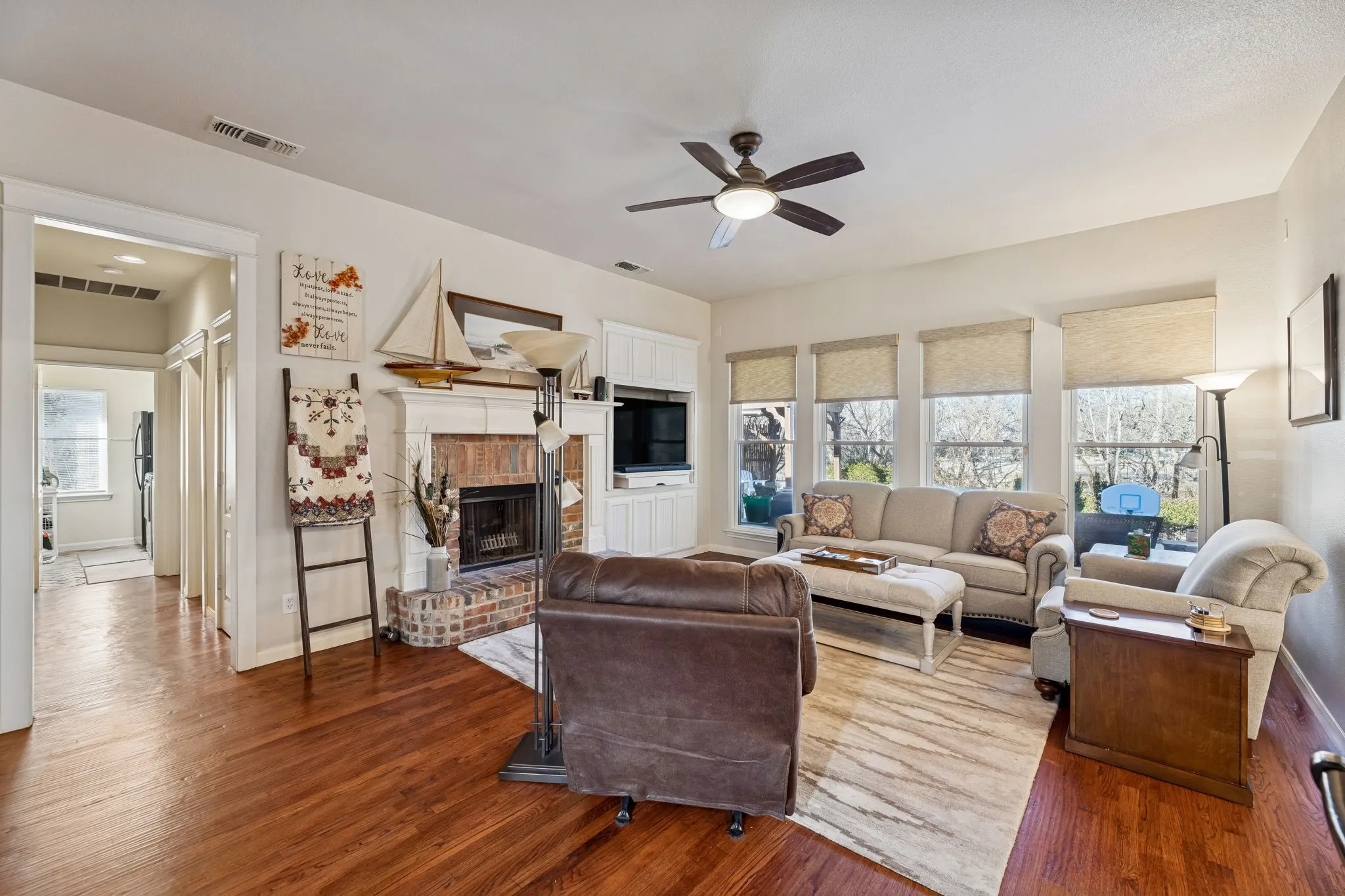 Gas logs in the fireplace and remote blinds to look out and the pool and greenery