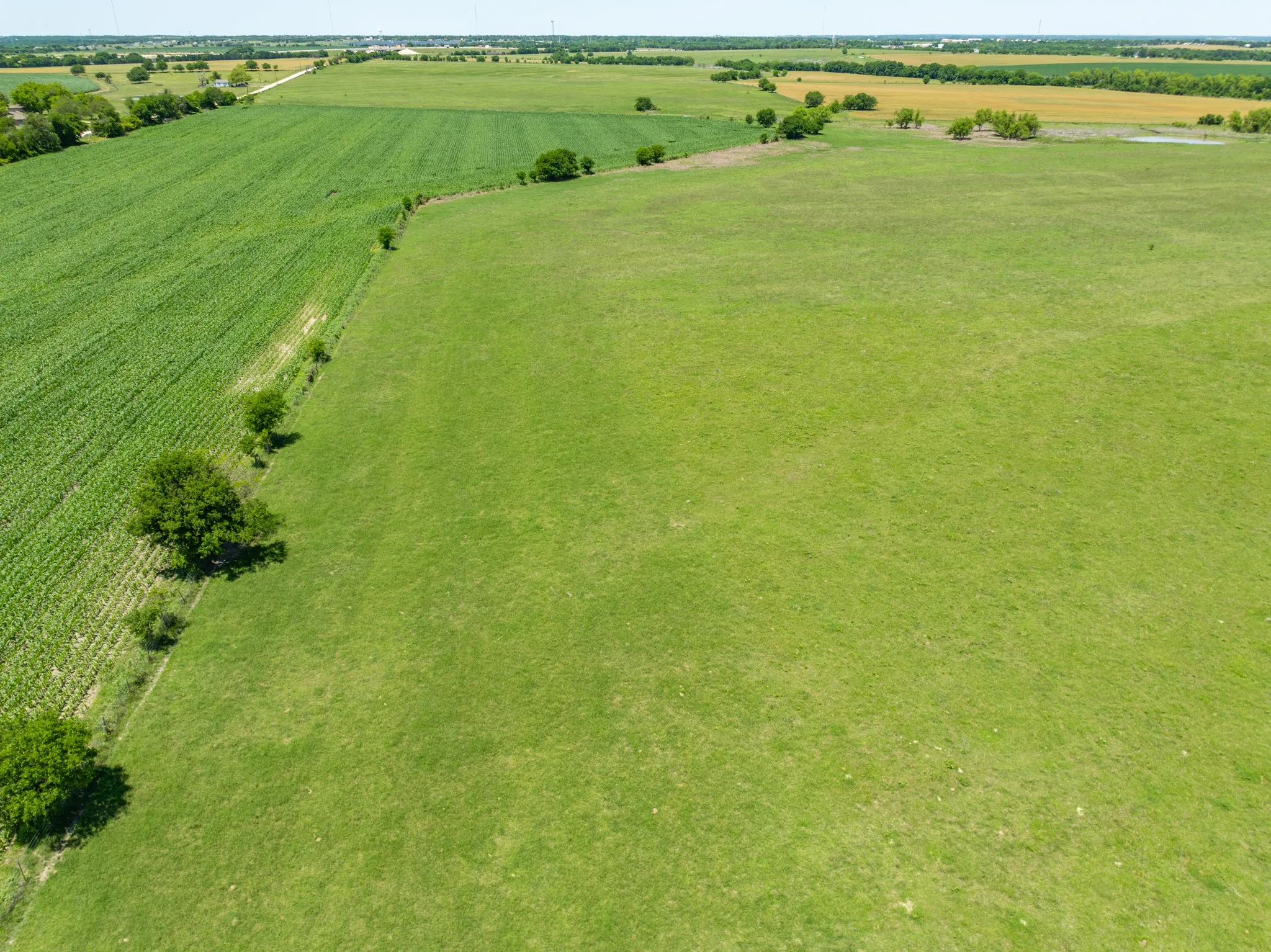 Overview of rural landscape with large plots for crops