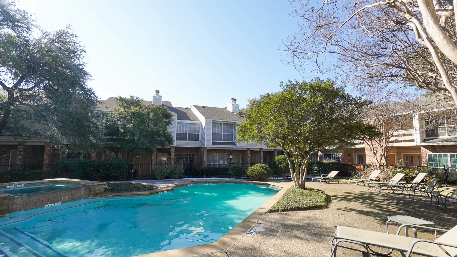 Integrated pool / spa featuring a patio