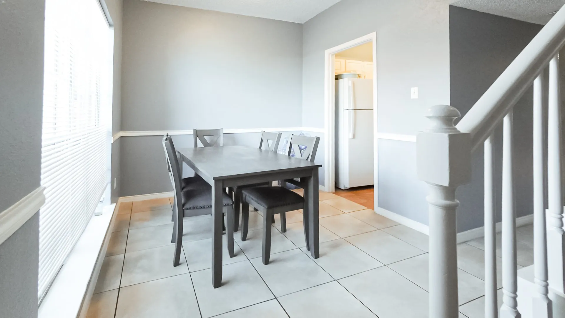 Dining area featuring light tile patterned floors