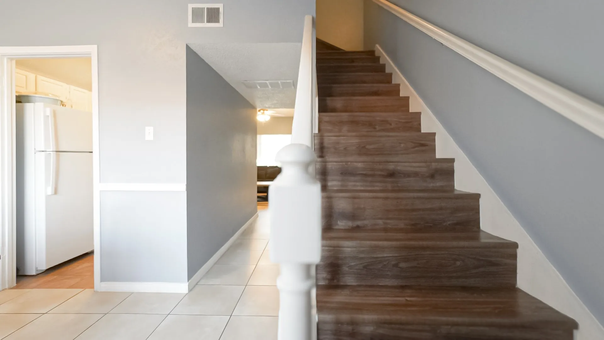 Stairs with tile patterned flooring