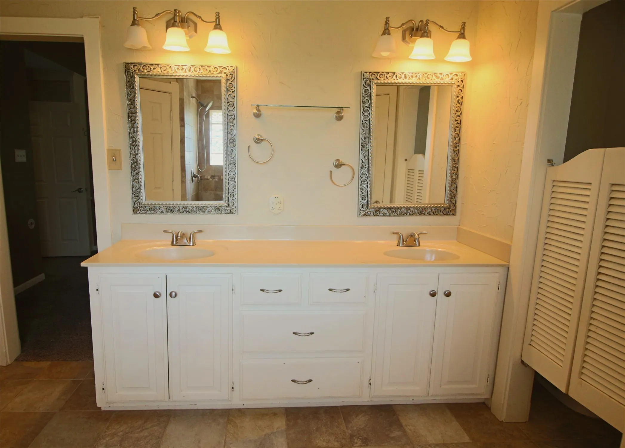 Master bath with built in cabinets