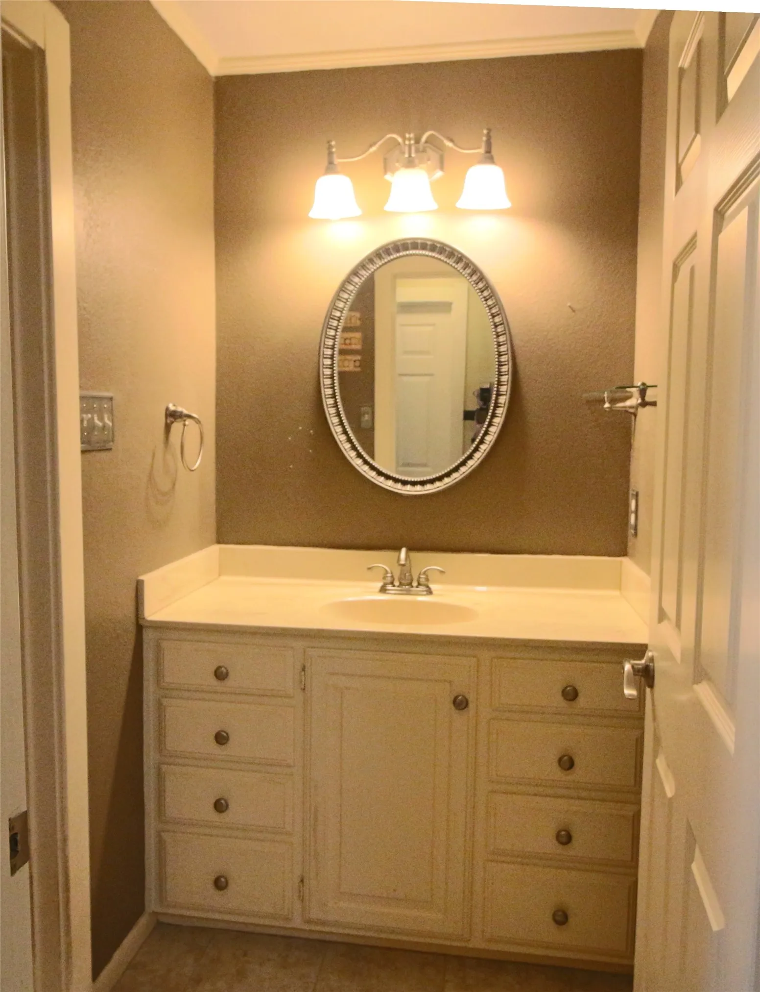 Guest bath vanity and mirror.