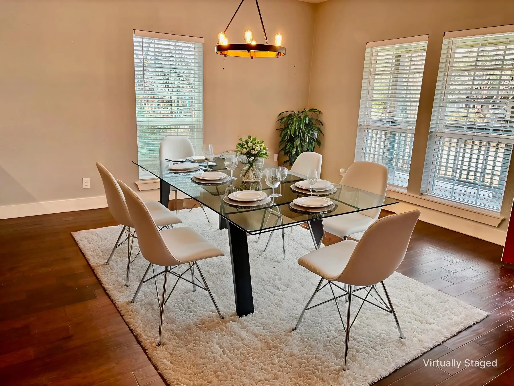 Dining room featuring a chandelier and dark wood finished floors
