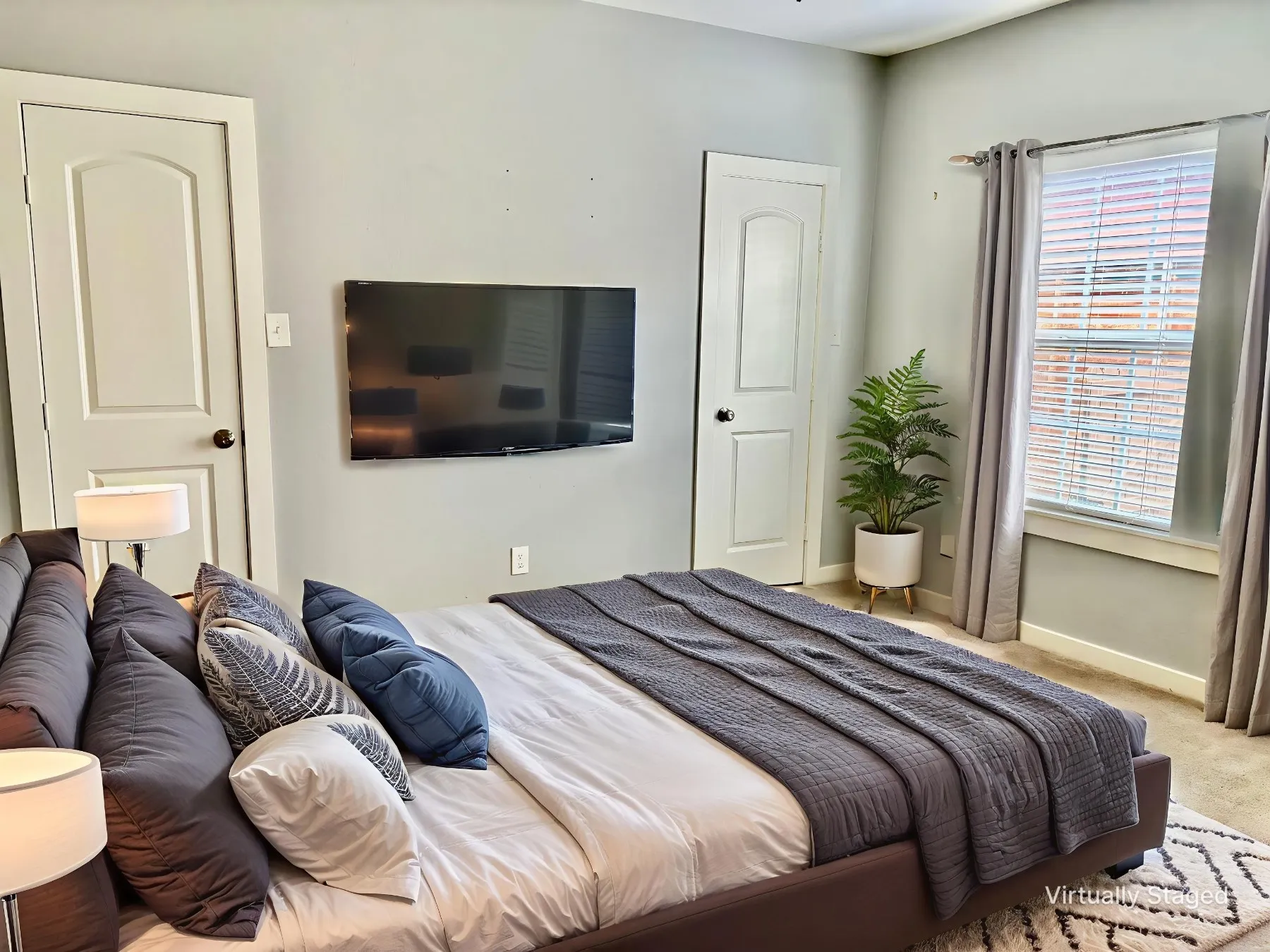 Bedroom with carpet flooring and baseboards