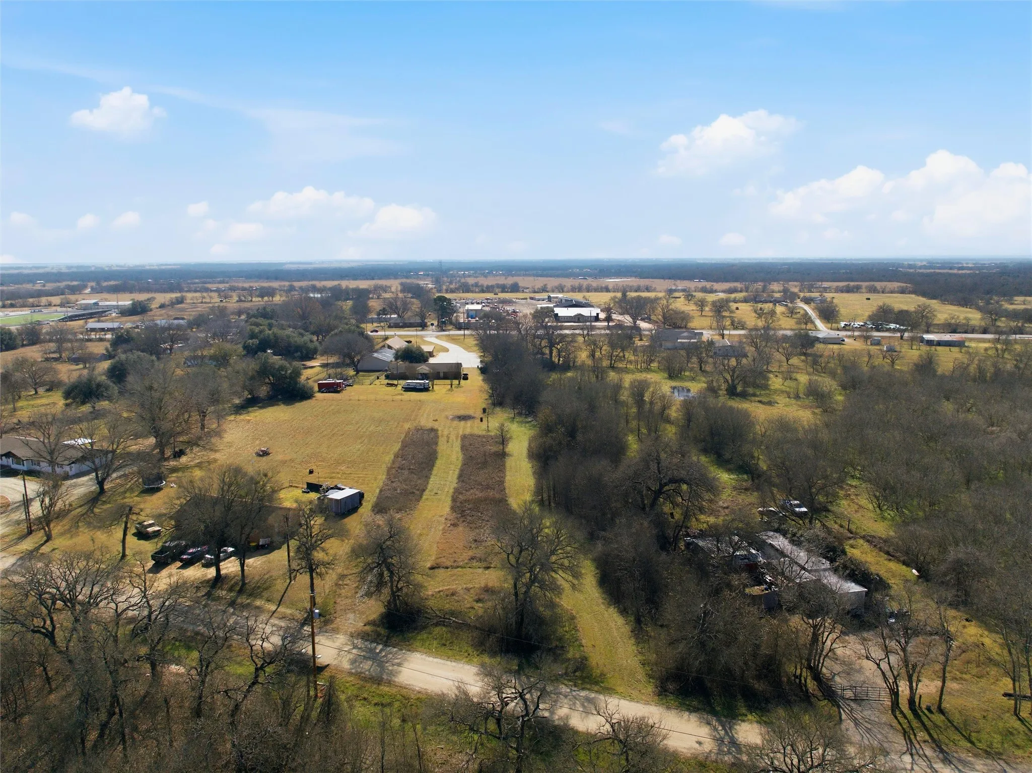 Aerial view of property's location with rural landscape