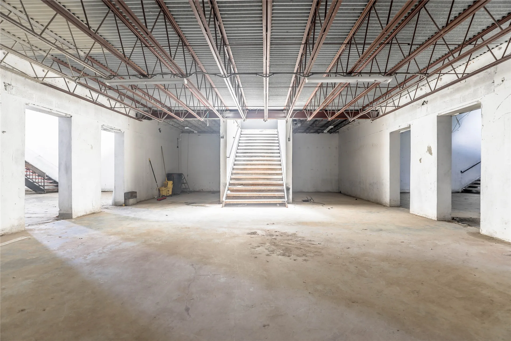 Miscellaneous room featuring a high ceiling