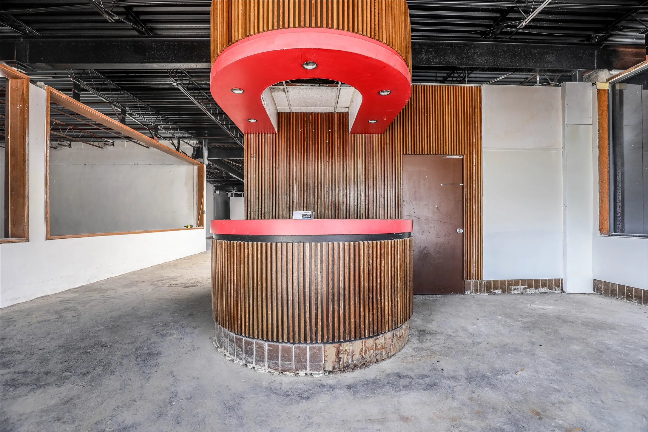 Reception with a dry bar and wooden walls