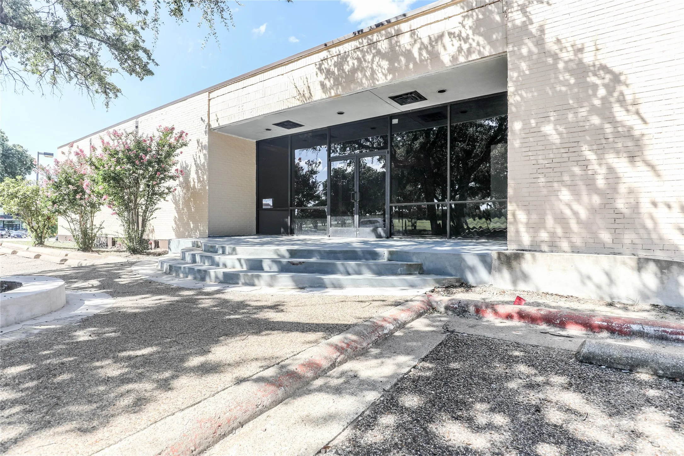 Property entrance with french doors and a patio area
