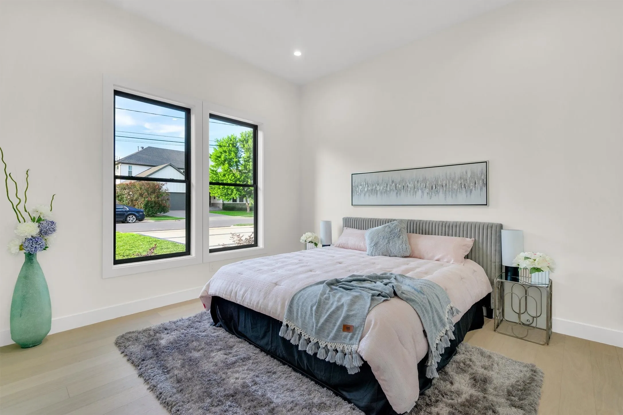 Bedroom featuring light wood-type flooring and recessed lighting