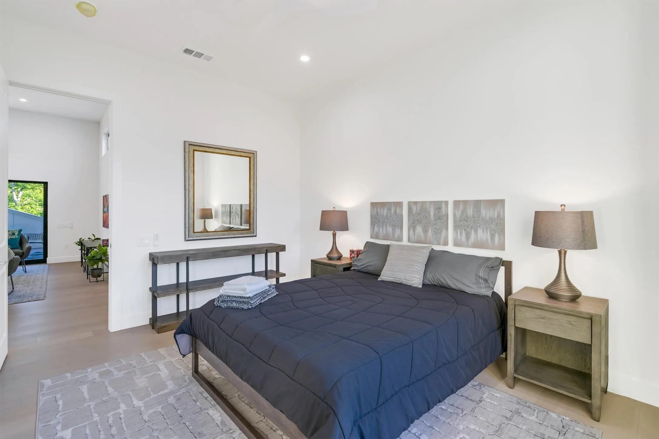 Bedroom with recessed lighting and light wood-type flooring