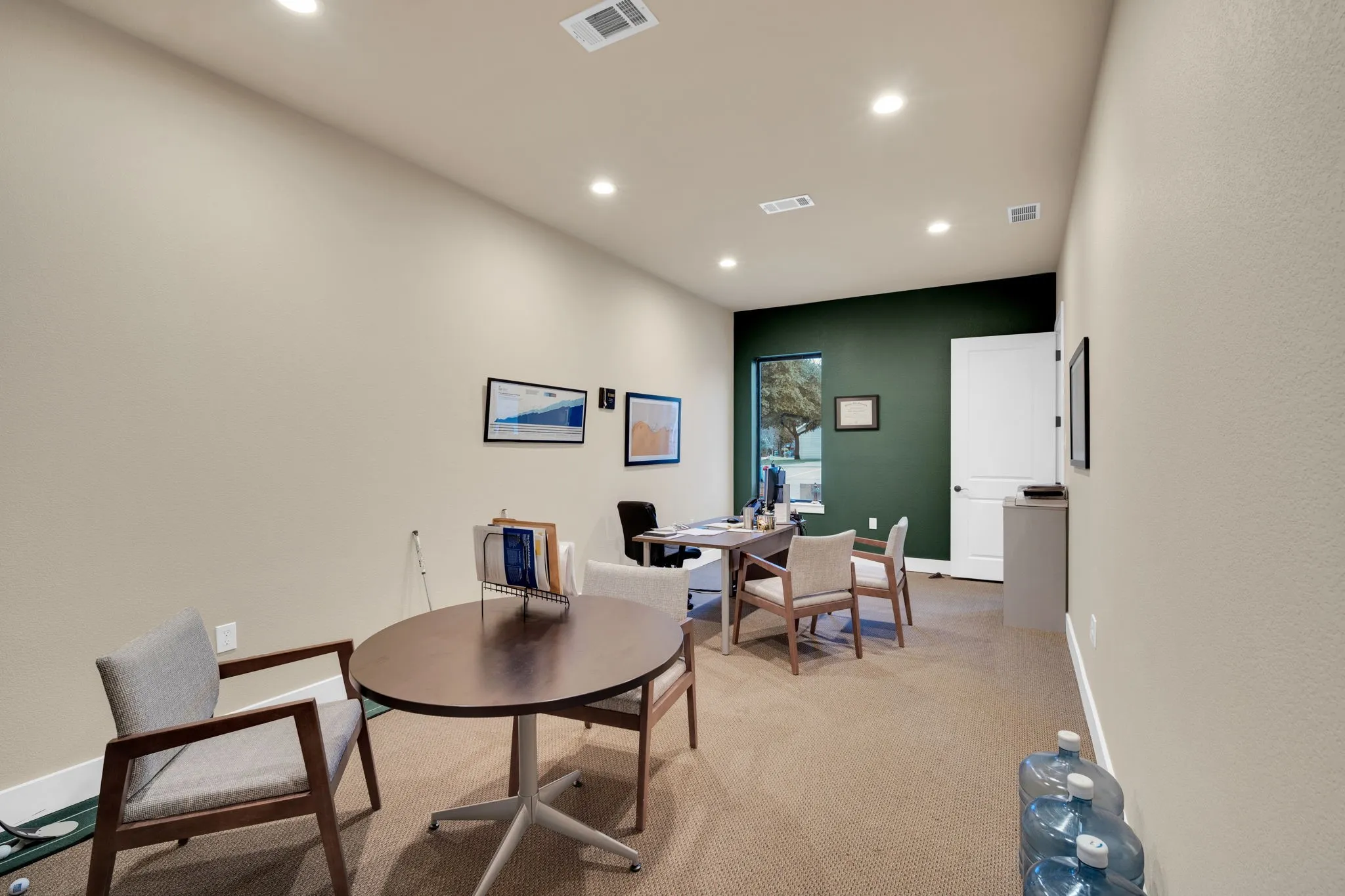 Versatile office space with room for a conference or meeting table, great for collaboration.