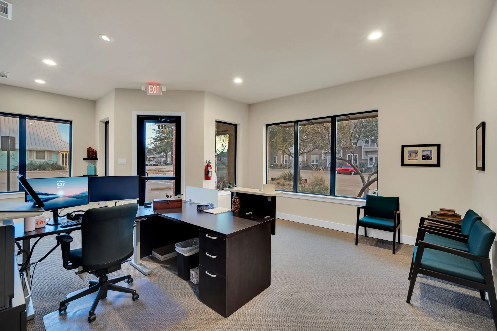 Bright reception space with large windows bringing in abundant natural light.