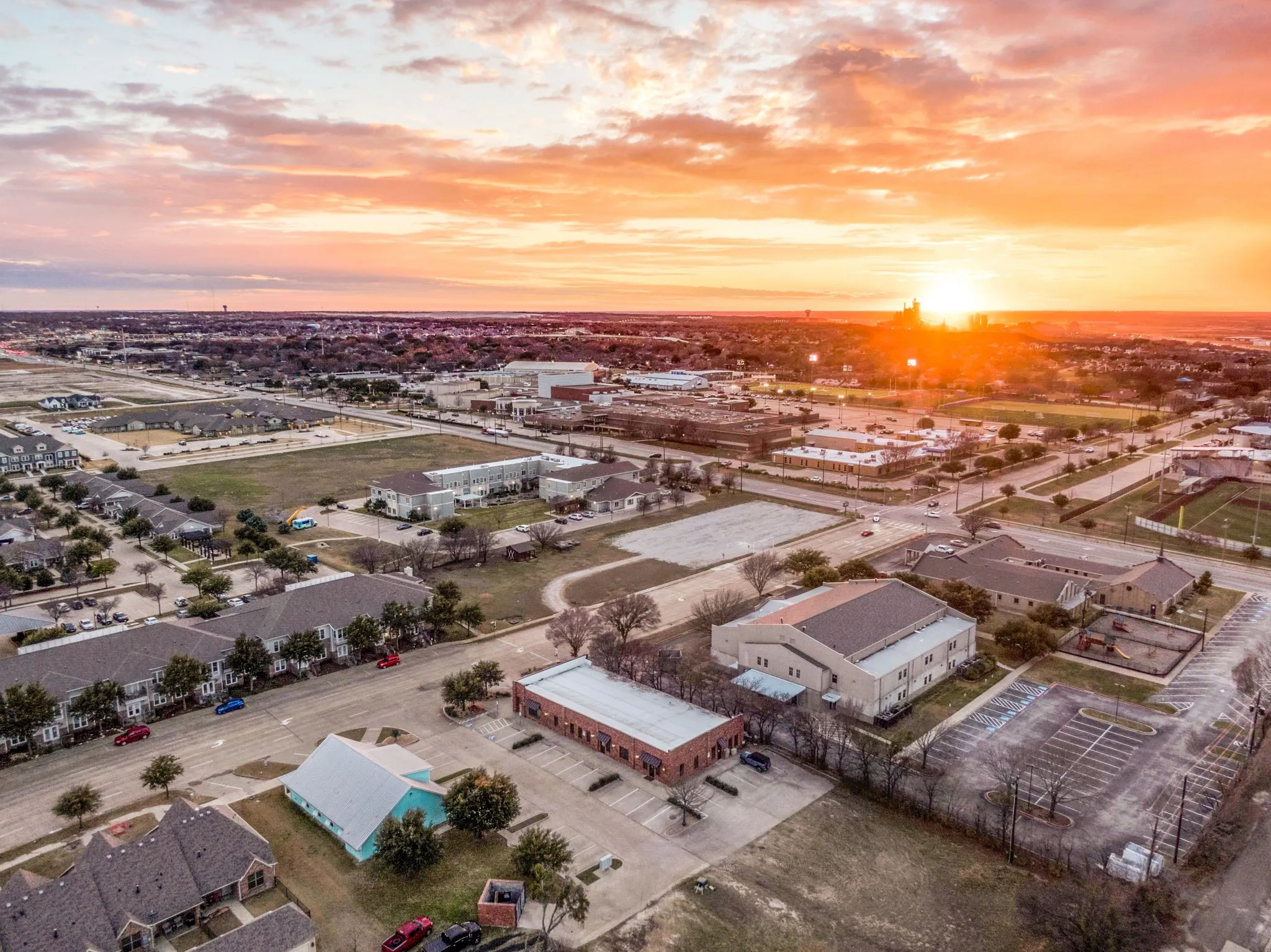 Final aerial view highlighting the building's strong presence within the community.