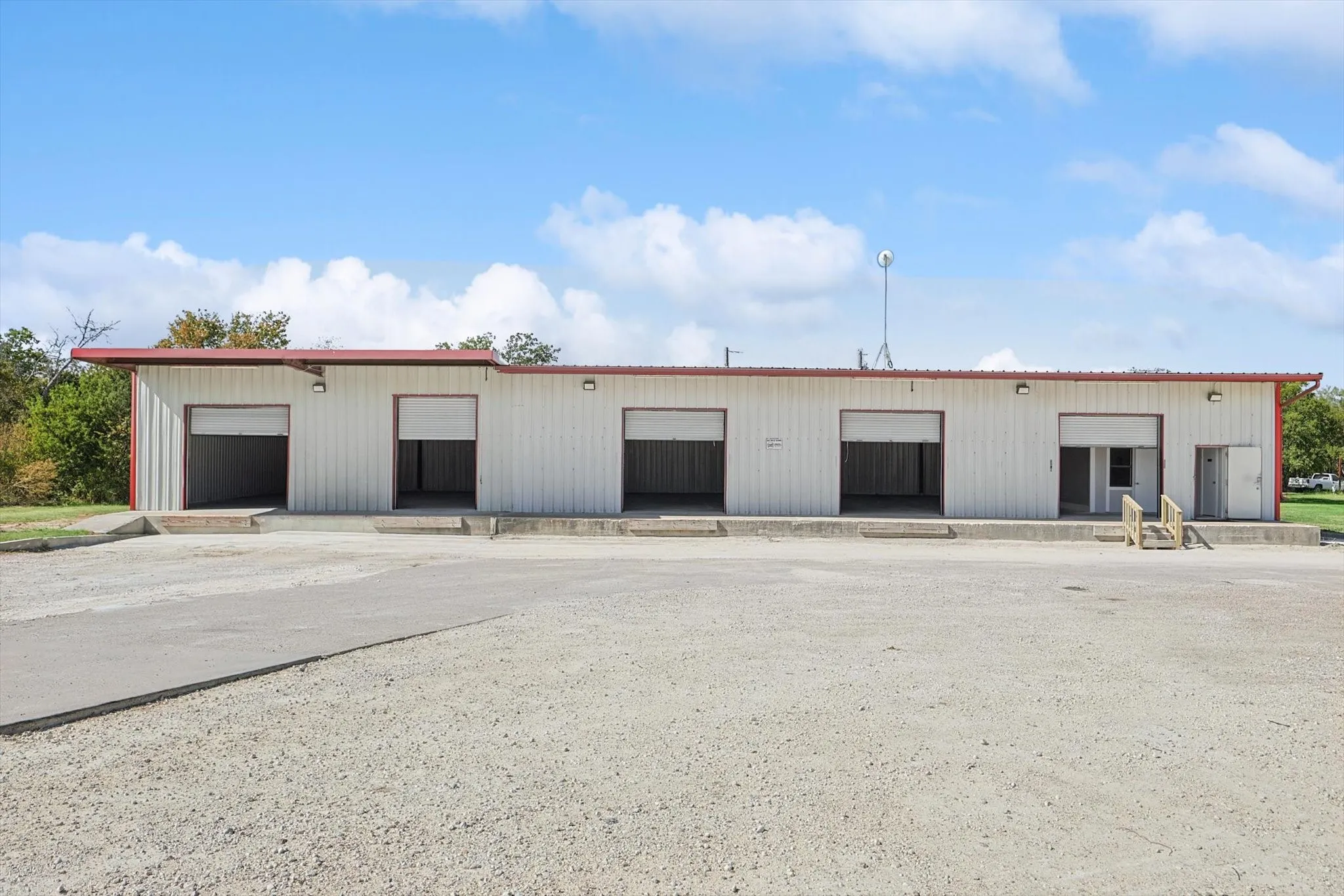 View of outbuilding with a garage