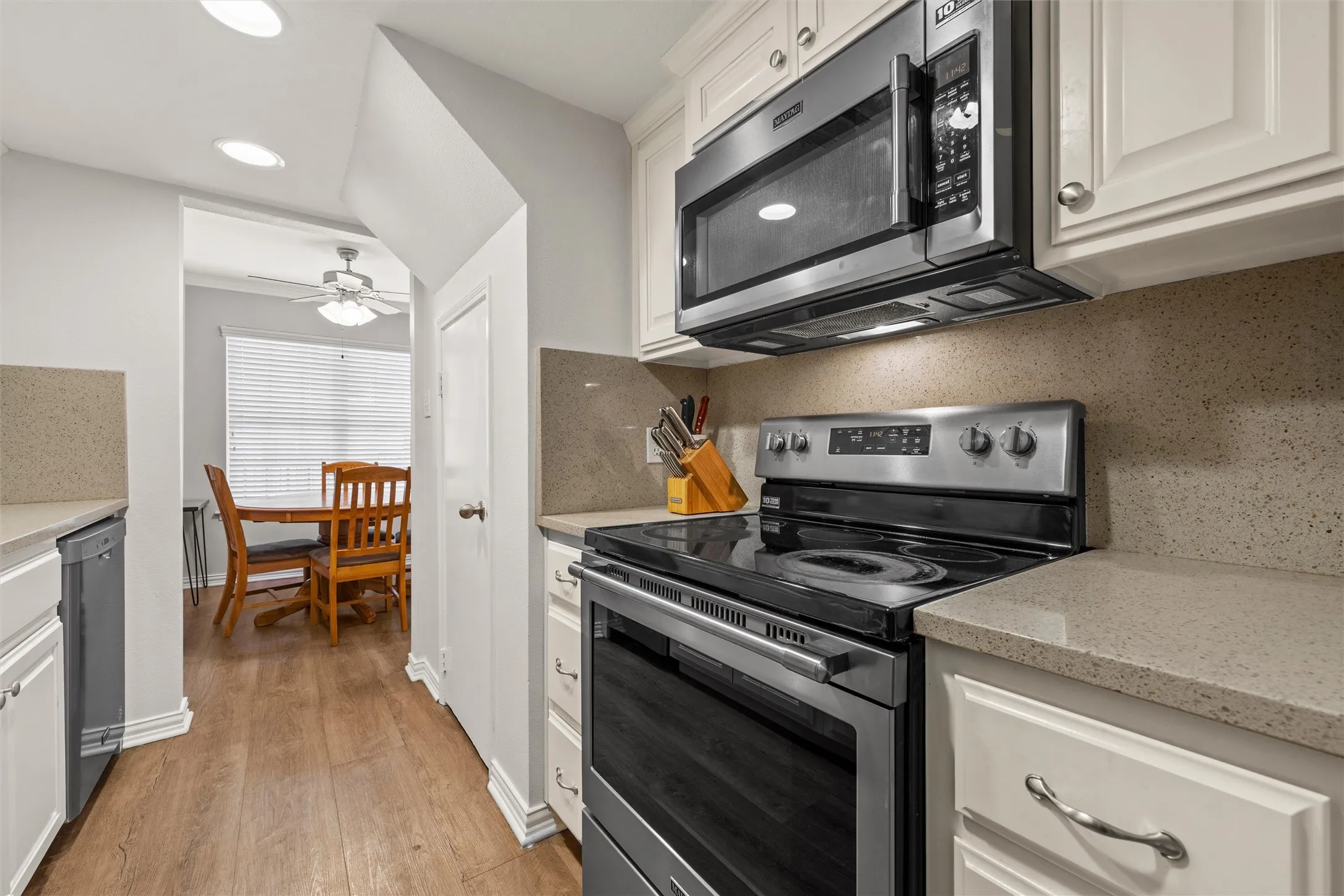 Updated kitchen with stainless steel appliances. Even the dishes, glasses, and silverware are included!