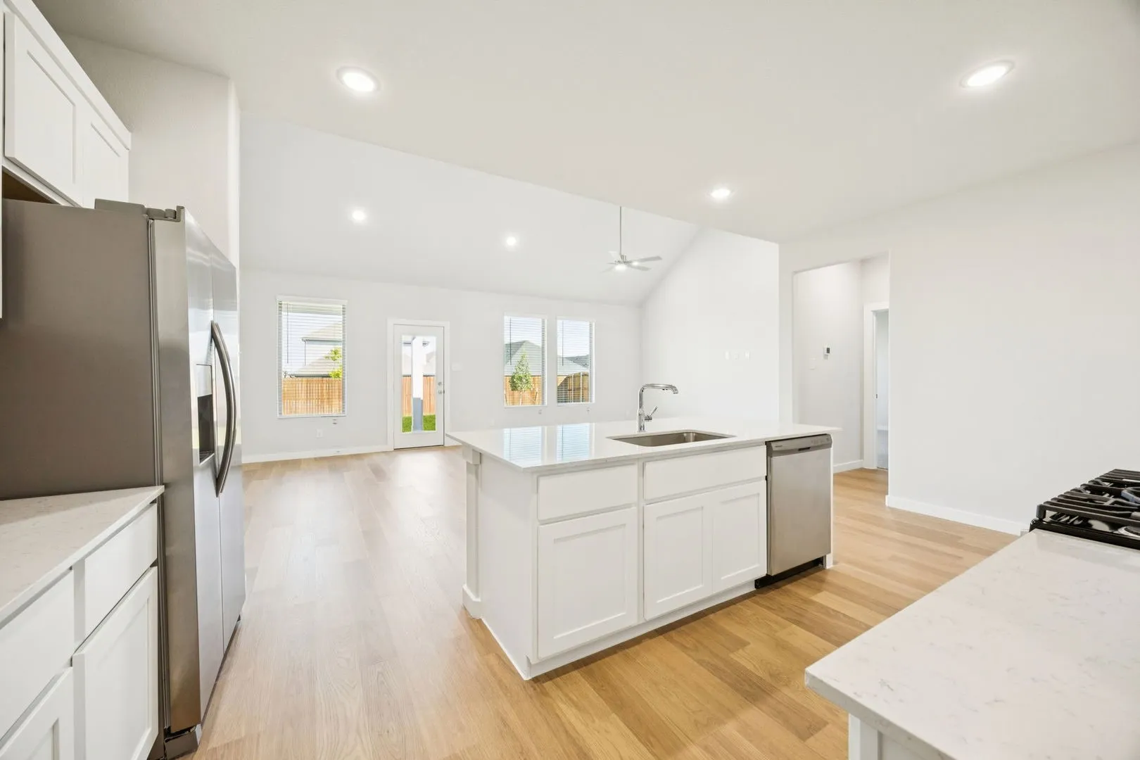 Kitchen in the Masters home plan by Trophy Signature Homes – REPRESENTATIVE PHOTO