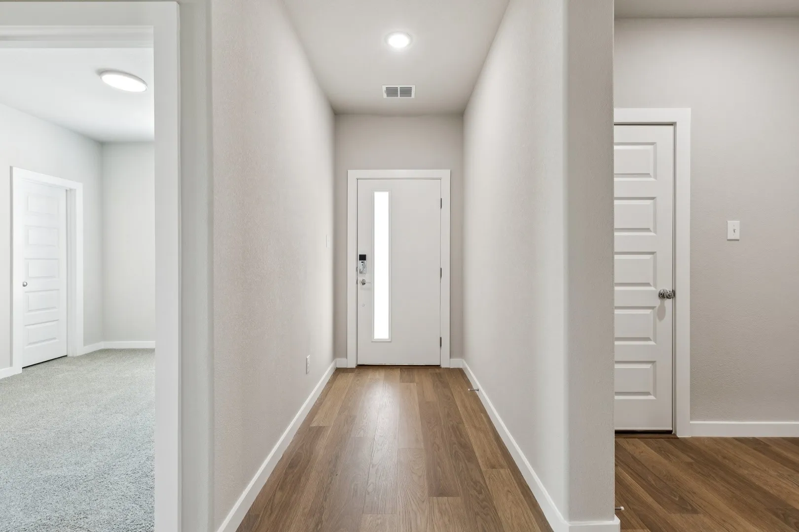 Entryway in the Emmy II home plan by Trophy Signature Homes - REPRESENTATIVE PHOTO