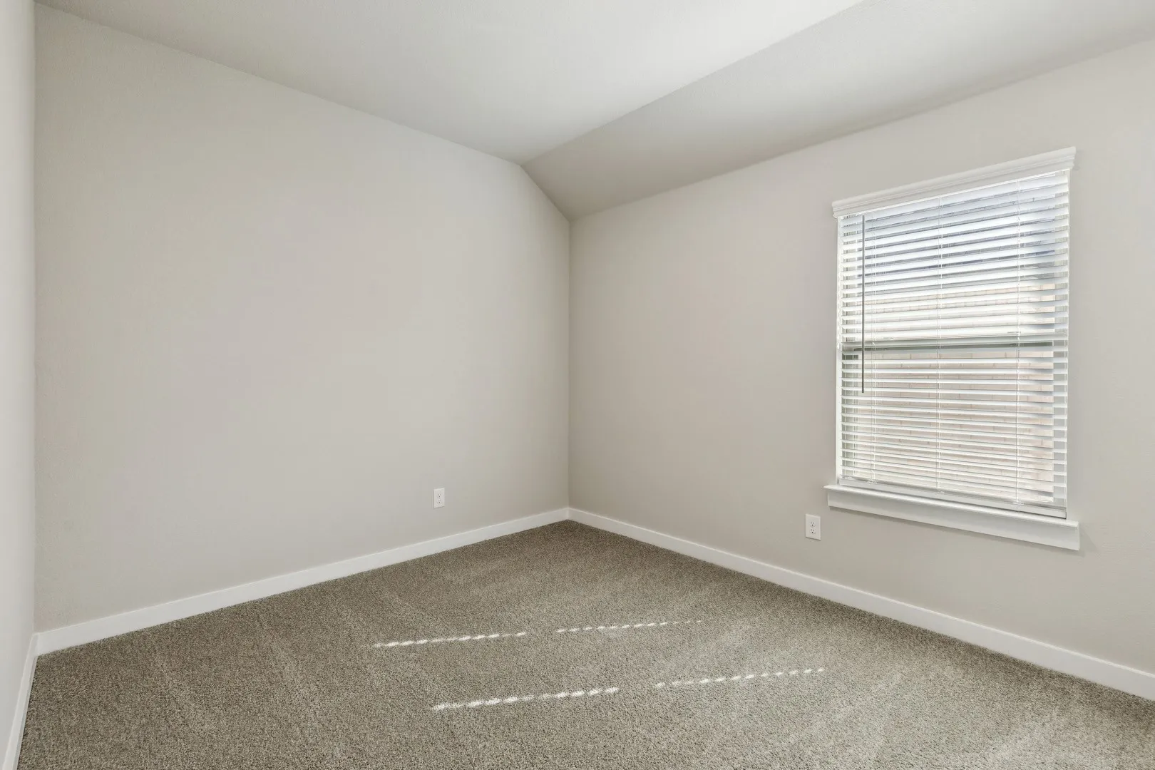 Bedroom in the Emmy II home plan by Trophy Signature Homes - REPRESENTATIVE PHOTO