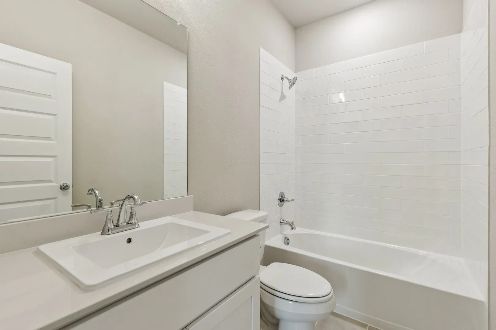 Bathroom in the Emmy II home plan by Trophy Signature Homes - REPRESENTATIVE PHOTO