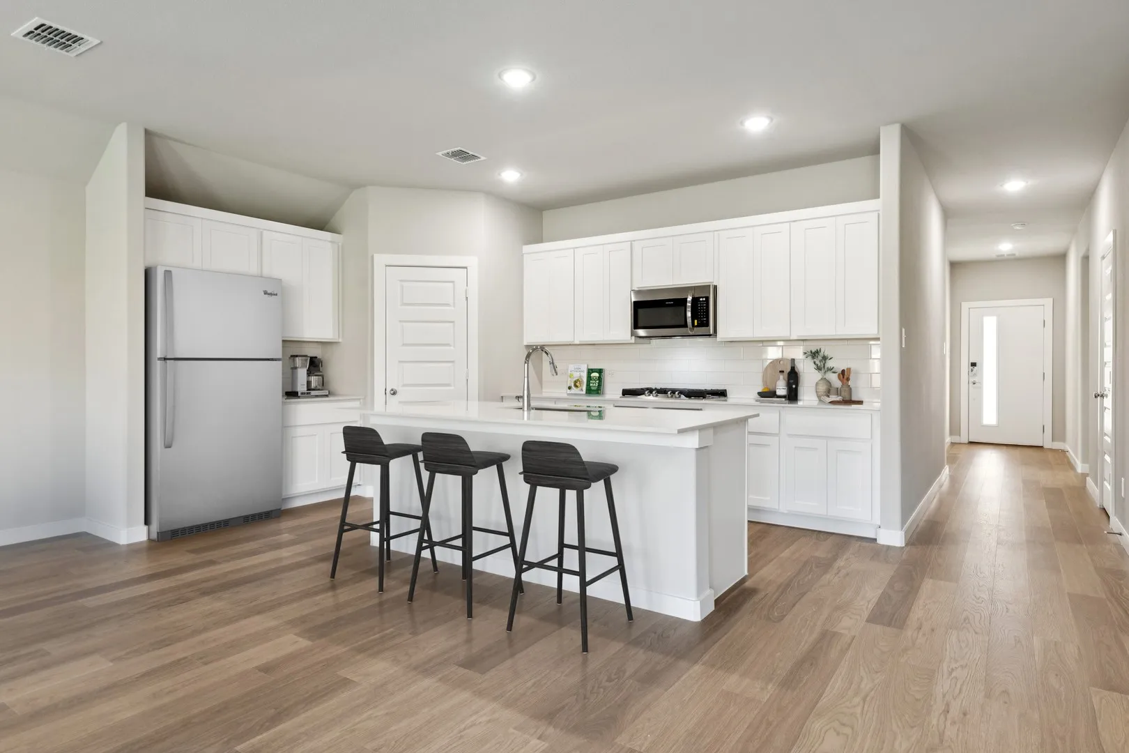 Kitchen in the Emmy II home plan by Trophy Signature Homes - REPRESENTATIVE PHOTO
