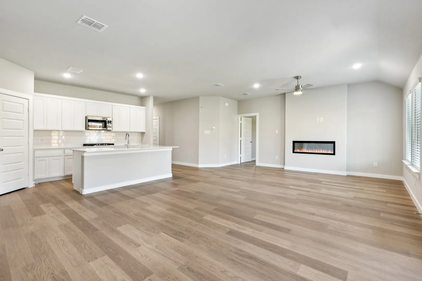 Open Floor Plan in the Emmy II home plan by Trophy Signature Homes - REPRESENTATIVE PHOTO