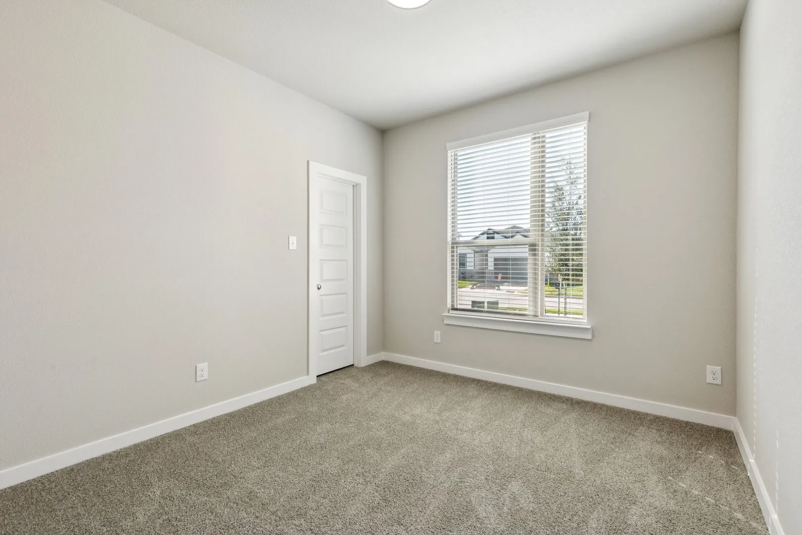 Bedroom in the Emmy II home plan by Trophy Signature Homes - REPRESENTATIVE PHOTO
