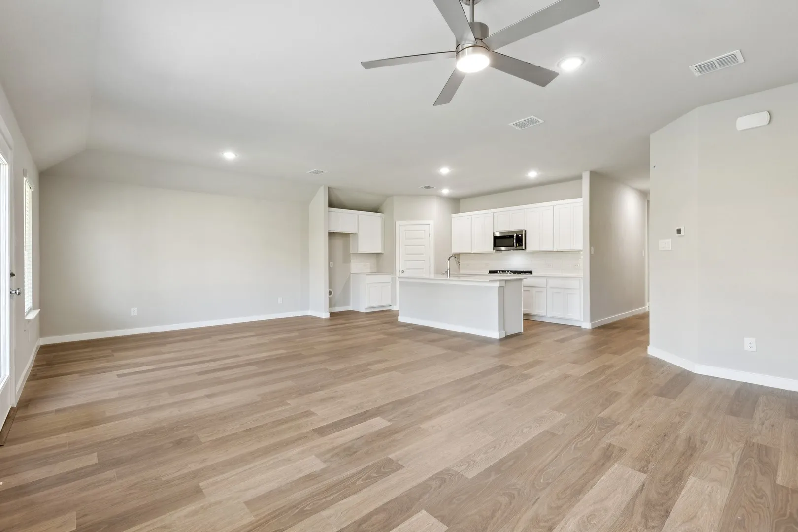 Open Floor Plan in the Emmy II home plan by Trophy Signature Homes - REPRESENTATIVE PHOTO