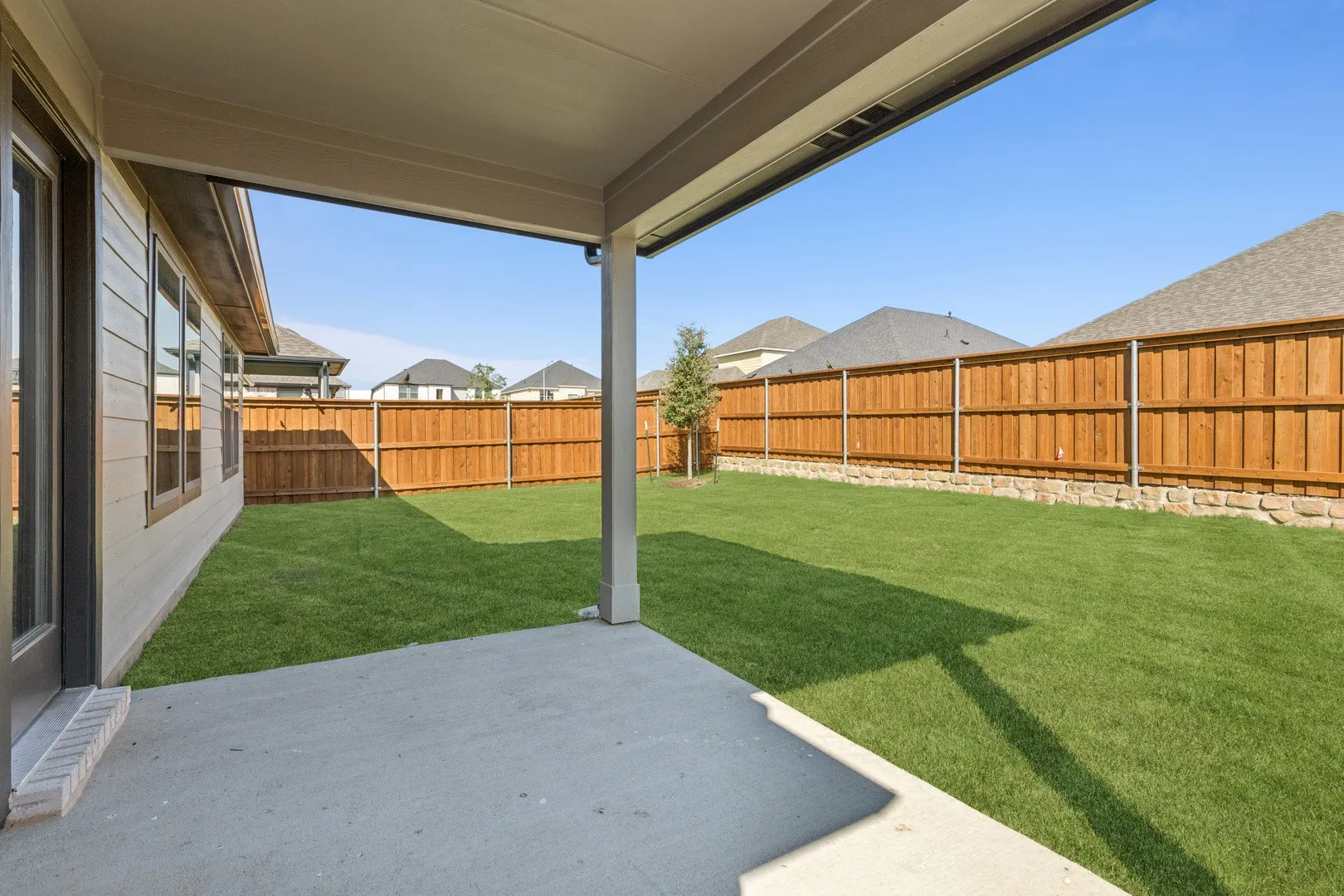 Patio in the Emmy II home plan by Trophy Signature Homes - REPRESENTATIVE PHOTO
